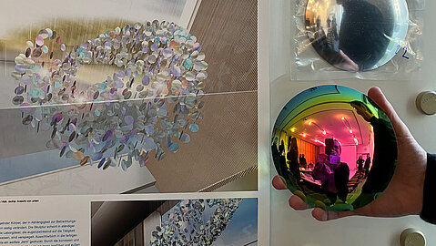 Foto einer Reflexion in einem Detail-Element eines der Entwürfe.